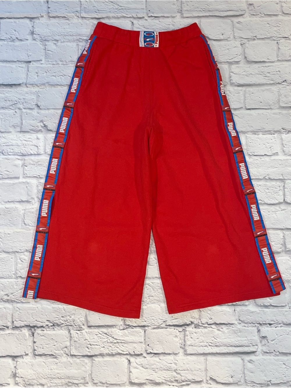 Puma Red Cropped Wide-Leg Pants with Branded Side Tape. Small
